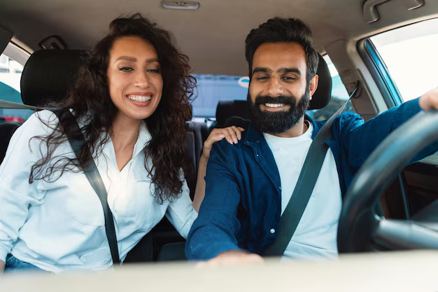 excited-arab-couple-enjoying-car-ride-sitting-new-automobile-inside-spouses-driving-testing_116547-66866